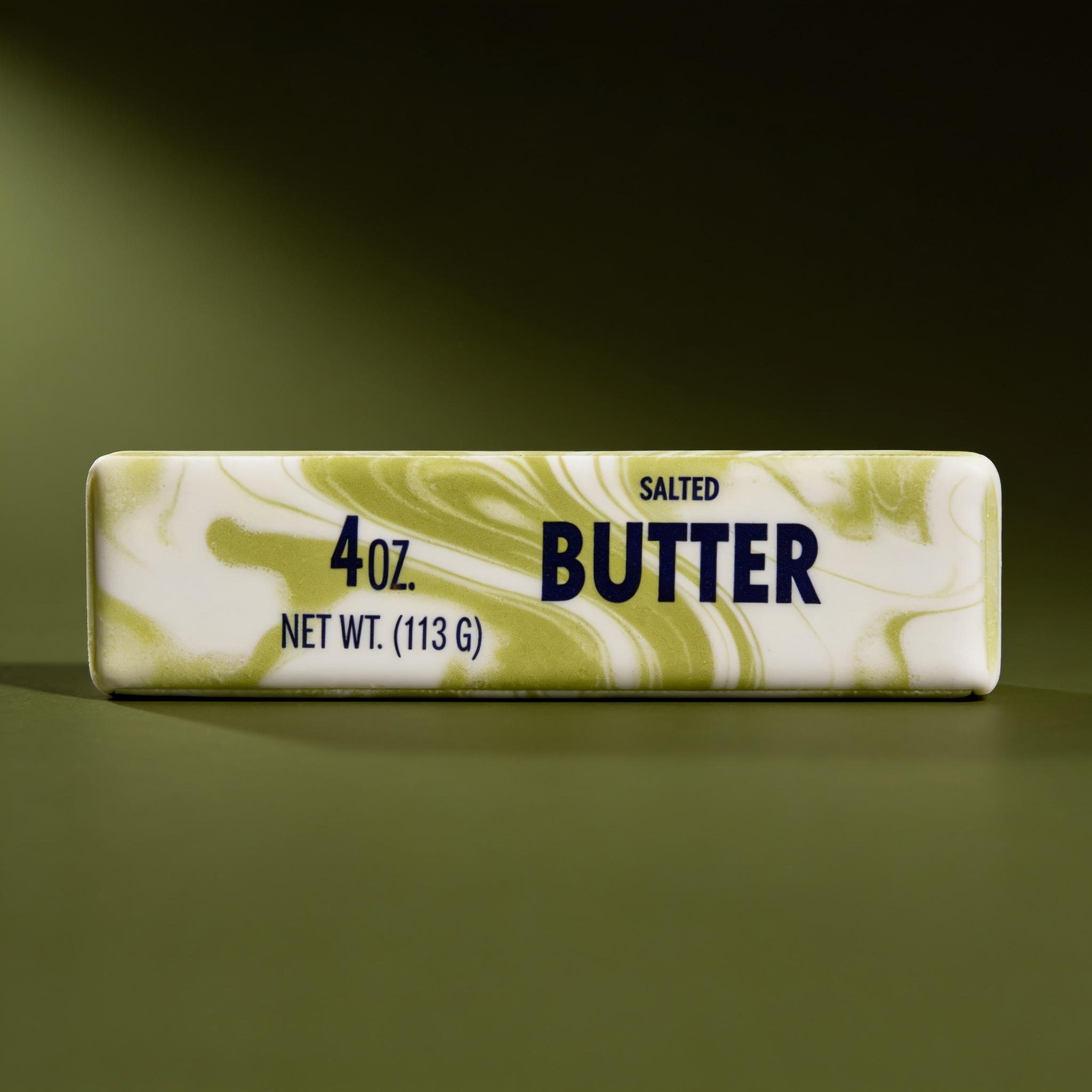 Close-up of the Green marble butter squishy 4oz swirl and matte foam