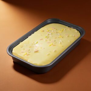 Mango cake squishy in its tray with colorful sprinkles