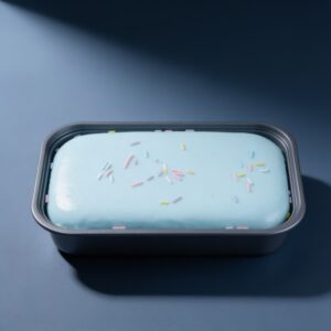 Sea salt cake squishy in its tray with colorful sprinkles